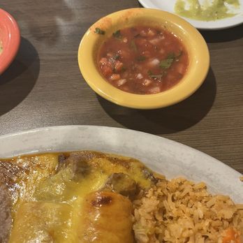 Los Primos Mexican Grill - Steak fajita enchilada and pico de gallo - Mexican Near Me - Houston, Texas