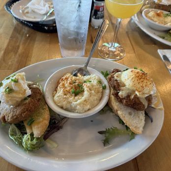 Bacchus On The Bayou - Crab cakes Benedict. The crab cakes were good with the poached egg. The grits were so good! - American Near Me - Ocean Springs, Mississippi Bacchus On The Bayou - Crab cakes Benedict. The crab cakes were good with the poached egg. The grits were so good! - American Near Me - Ocean Springs, Mississippi