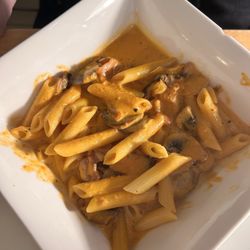 Michelangelo Restaurant - Pasta Primavera with mushrooms, bacon, tomato, brandy, and cream