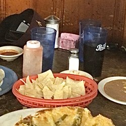 Chips & salsa, cheese crisp with green chilies, side of refried beans.