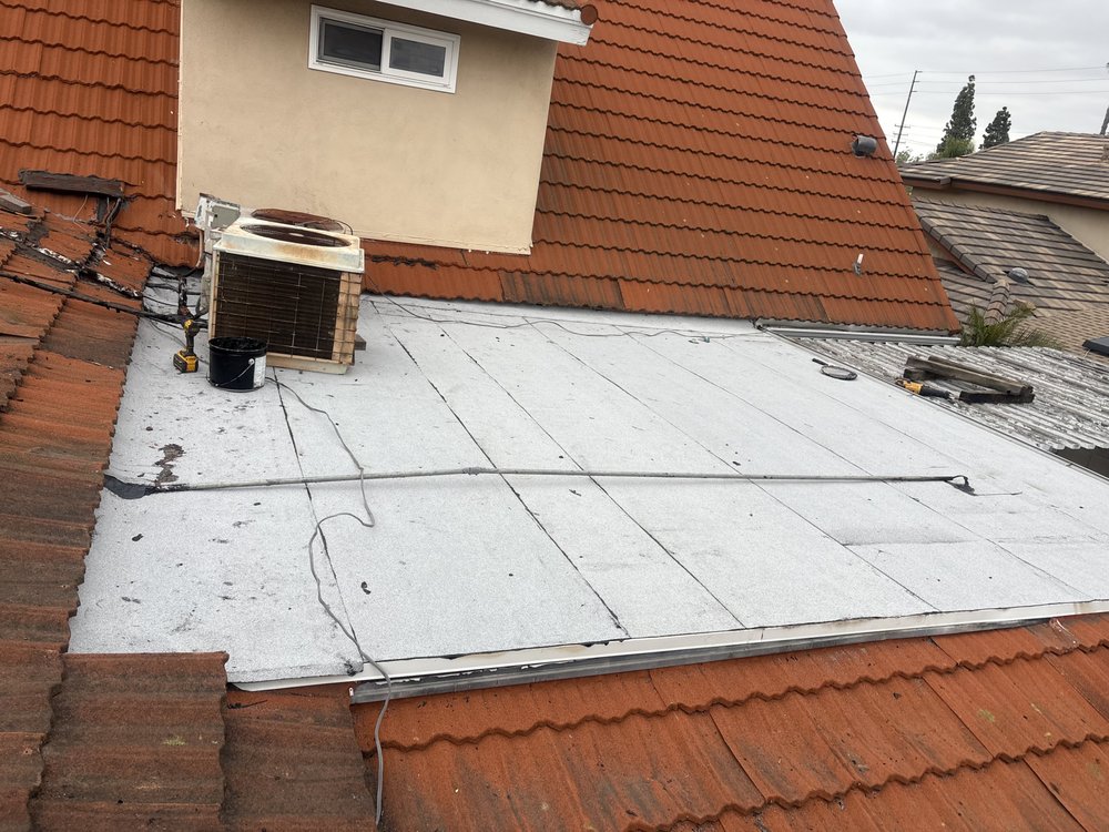 Slide of Aguilar Roofin Repair