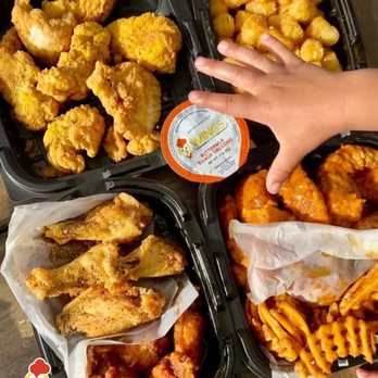 Wings Over Providence - two trays of chicken wings and french fries - Chicken Wings Near Me - Providence, Rhode Island Wings Over Providence - two trays of chicken wings and french fries - Chicken Wings Near Me - Providence, Rhode Island