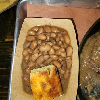 Ruston Cattle Company - That's a small paper tray with, I shit you not, one bite size of very firm cornbread. - Steakhouses Near Me - Ennis, Texas Ruston Cattle Company - That's a small paper tray with, I shit you not, one bite size of very firm cornbread. - Steakhouses Near Me - Ennis, Texas