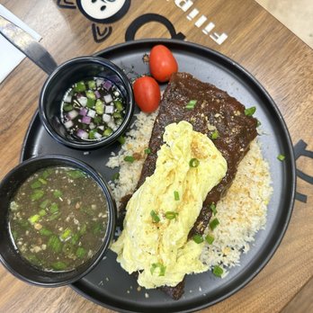 Adoboink - Pork Rib Silog- sweet ribs with perfectly scrambled eggs over garlic rice. The soup on the side was a nice touch with spicy vinegar. - Filipino Near Me - Roseville, California