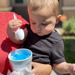 Snow and Dough - Pineapple was so good he decided to eat his Auntie's Blue Raspberry.