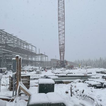 Ripple Construction - a construction site with a crane in the background - General Contractors Near Me