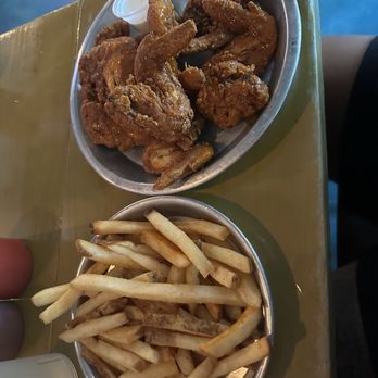 Shuckin' Shack Oyster Bar - wings and fries - Sports Bars Near Me - Leland, North Carolina
