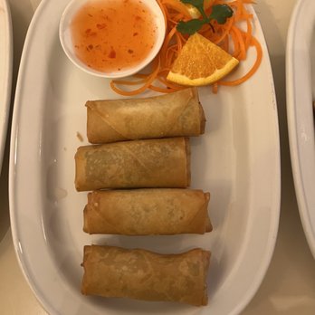 Bangkok Garden - a plate of spring rolls and a bowl of dipping sauce - Thai Near Me - Ogden, Utah