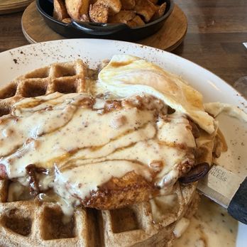 J. Wilson's - JW's green chili brisket with cheesy grits, and chicken and waffles - New American Near Me - Beaumont, Texas J. Wilson's - JW's green chili brisket with cheesy grits, and chicken and waffles - New American Near Me - Beaumont, Texas