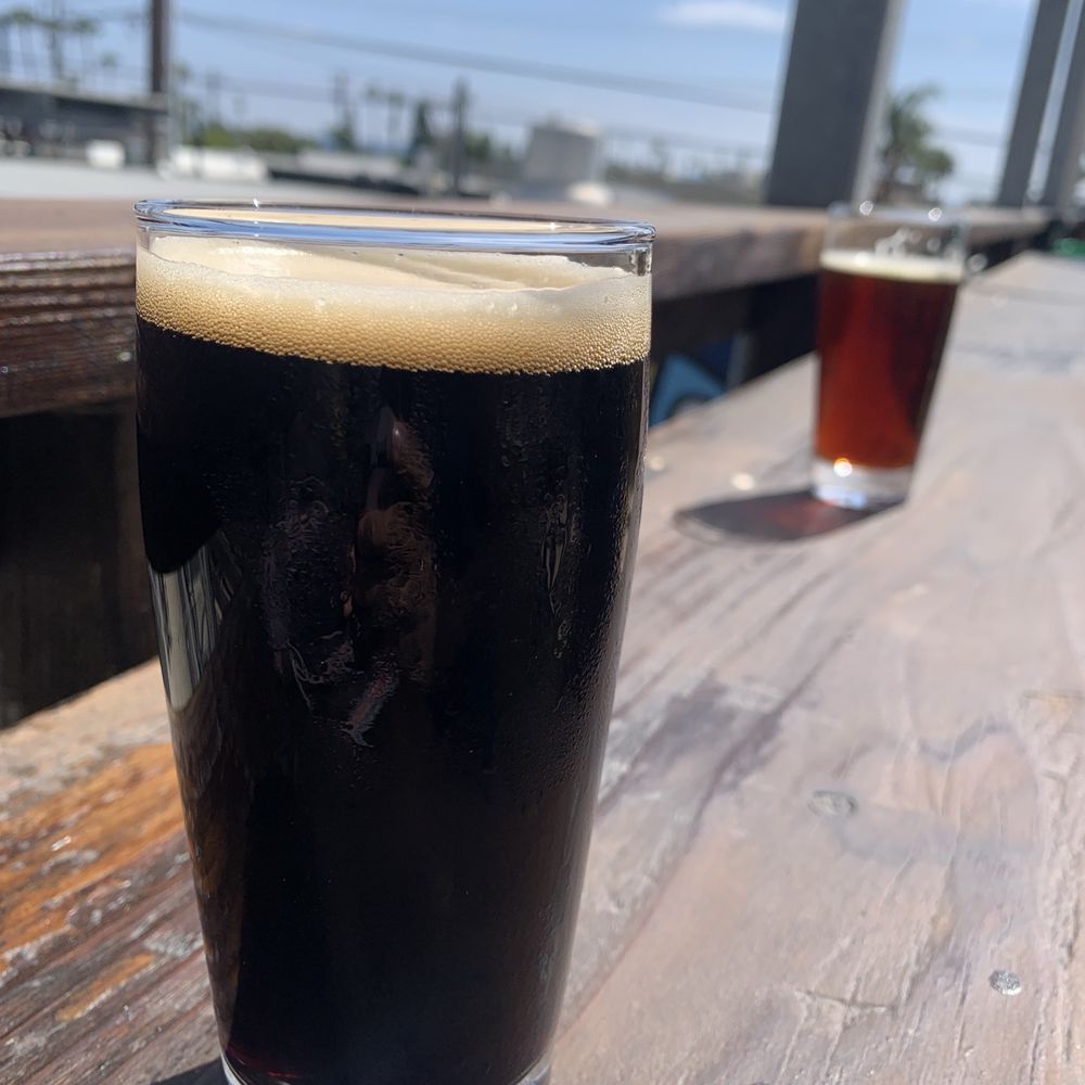 Green Cheek Beer Co. - Balcony bat seating outside - Breweries Near Me - Oceanside, California Green Cheek Beer Co. - Balcony bat seating outside - Breweries Near Me - Oceanside, California