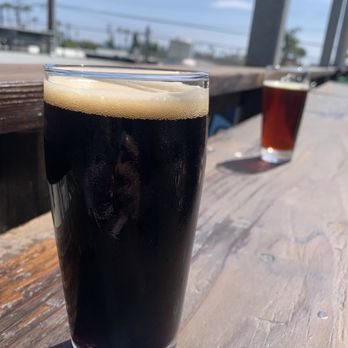 Green Cheek Beer Co. - Balcony bat seating outside - Breweries Near Me - Oceanside, California Green Cheek Beer Co. - Balcony bat seating outside - Breweries Near Me - Oceanside, California