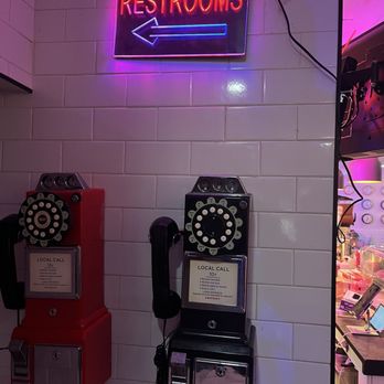 Diner 24 - Wall mounted retro phones. - Burgers Near Me - New York, New York