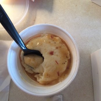 Popeyes - Half filled cup of potatoes and gravy - Fast Food Near Me - Poplar Bluff, Missouri
