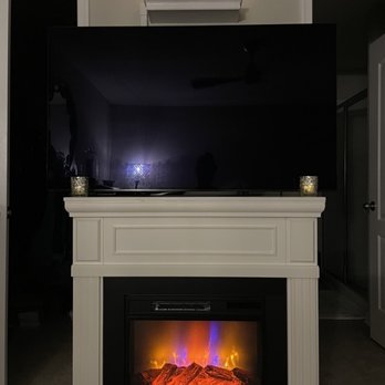 Griffins Handyman - Assembled and installed electric fireplace with safety wall hooks. Also attached the shelf above the fireplace. - Home Automation Near Me Griffins Handyman - Assembled and installed electric fireplace with safety wall hooks. Also attached the shelf above the fireplace. - Home Automation Near Me