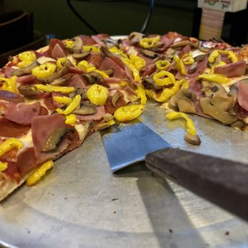 Green Lantern Pizza - Delicious supreme pizza with banana peppers... - Pizza Near Me - Clinton Township, Michigan Green Lantern Pizza - Delicious supreme pizza with banana peppers... - Pizza Near Me - Clinton Township, Michigan