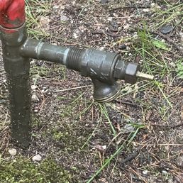 Hose hook up in the wrong at location and no handle to turn the water on. Hose hook up in the wrong at location and no handle to turn the water on.