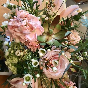 Botanica Floral Design - Succulent nestled in with lilies,sweet peas,roses and wax flowers. - Florists Near Me - Portland, Oregon