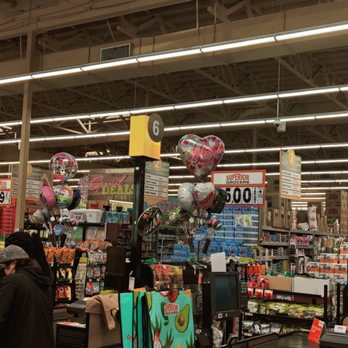 Superior Grocers - a woman shopping in a grocery store - Grocery Near Me - El Monte, California
