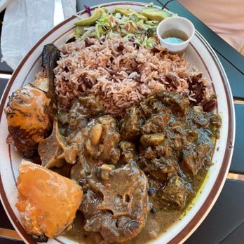 Sipho's Restaurant and Cafe - Sampler with jerk chicken, ox tail and curry goat - Caribbean Near Me - Chico, California Sipho's Restaurant and Cafe - Sampler with jerk chicken, ox tail and curry goat - Caribbean Near Me - Chico, California