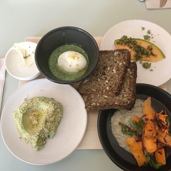 Kantine - Brunch Board: Danish rye bread, melon salad + mint tarragon, three lentil hummus, runny egg w/ asparagus, lemony broccoli spread - $16.28 - Scandinavian Near Me - San Francisco, California Kantine - Brunch Board: Danish rye bread, melon salad + mint tarragon, three lentil hummus, runny egg w/ asparagus, lemony broccoli spread - $16.28 - Scandinavian Near Me - San Francisco, California
