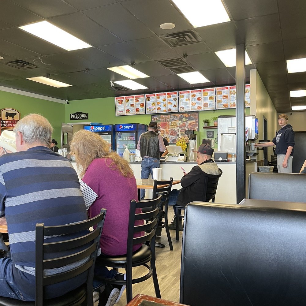 JLB Eatery - people sitting at tables in a restaurant - Burgers Near Me - Tomball, Texas JLB Eatery - people sitting at tables in a restaurant - Burgers Near Me - Tomball, Texas