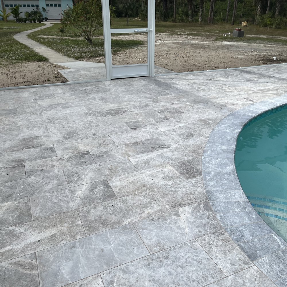 Tile Installed completely flat, no lipping, excellent job.