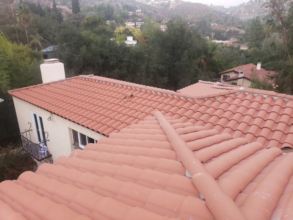 Slide of 2Gun Roofing & Waterproofing