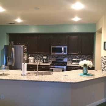 Capital Counters & Cabinets - After- Flattened counter to one level, back splash, can lighting. Beautiful! - Flooring Near Me - Corona, California Capital Counters & Cabinets - After- Flattened counter to one level, back splash, can lighting. Beautiful! - Flooring Near Me - Corona, California