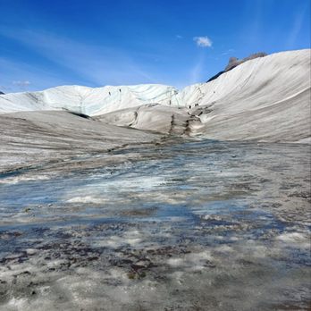 Kennicott Wilderness Guides - Glacier pool - Tours Near Me - Kennicott, Alaska Kennicott Wilderness Guides - Glacier pool - Tours Near Me - Kennicott, Alaska