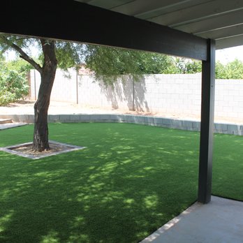 New Creations Landscape Services - They installed this nice border wall and artificial turf. - Landscaping Near Me