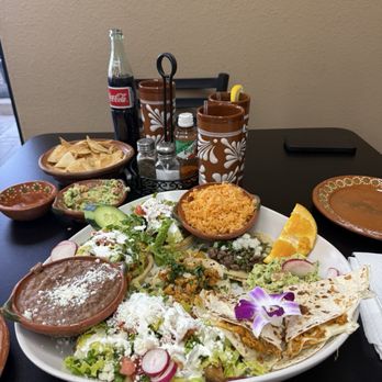 Sombrero's Mexican Grill - Plate - 2 Sopes, 2 tacos, 2 taquitos, quesadilla, beans and rice. - Mexican Near Me - Covina, California Sombrero's Mexican Grill - Plate - 2 Sopes, 2 tacos, 2 taquitos, quesadilla, beans and rice. - Mexican Near Me - Covina, California