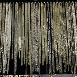 Assortment of 14k chains in various styles and sizes