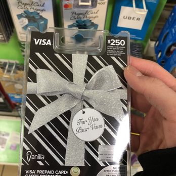 7-Eleven - a person holding a gift card in a store - Convenience Stores Near Me - Waterloo, Ontario 7-Eleven - a person holding a gift card in a store - Convenience Stores Near Me - Waterloo, Ontario