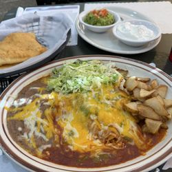 La Dos Gringas - Chicken enchiladas with red & green chile, potatoes & beans.