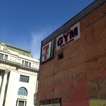 7-Eleven - a sign on the side of a building - Convenience Stores Near Me - Dallas, Texas 7-Eleven - a sign on the side of a building - Convenience Stores Near Me - Dallas, Texas