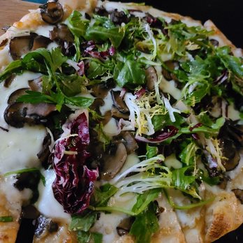 Monti's - Exotic Mushroom Pizza with Fontina Cheese and Frisee. - Mediterranean Near Me - Santa Rosa, California Monti's - Exotic Mushroom Pizza with Fontina Cheese and Frisee. - Mediterranean Near Me - Santa Rosa, California