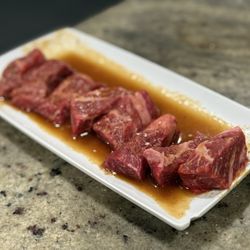 Chris Korean BBQ - Seasoned beef ribs "ju mul luk galbi"