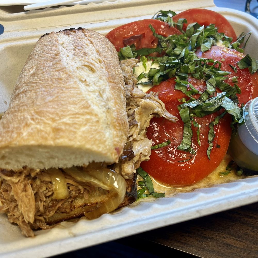 Cafe Gabriela - 1/2 pulled pork adobo sandwich 1/2 tomato mozzarella salad, all for less than $11 and delicious! - Coffee & Tea Near Me - Oakland, California Cafe Gabriela - 1/2 pulled pork adobo sandwich 1/2 tomato mozzarella salad, all for less than $11 and delicious! - Coffee & Tea Near Me - Oakland, California