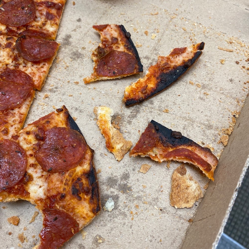 Domino's Pizza - a half eaten slice of pizza - Pizza Near Me - Selma, Alabama Domino's Pizza - a half eaten slice of pizza - Pizza Near Me - Selma, Alabama