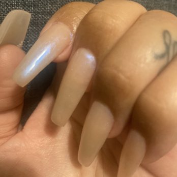 Luxury Nails & Spa - The acrylic on my index finger is overlapping my cuticle which will cause it to lift. - Nail Salons Near Me - Manteca, California