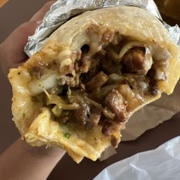 Al pastor burrito with guacamole (they forgot to add the guacamole) Al pastor burrito with guacamole (they forgot to add the guacamole)
