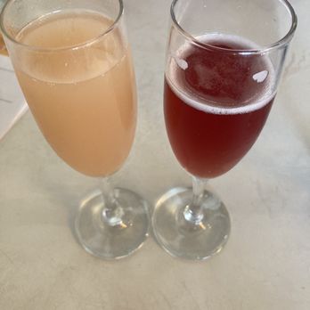 Briarpatch Restaurant - The peach Bellini and pomegranate mimosas. - American Near Me - Winter Park, Florida