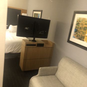 Club Quarters Hotel World Trade Center, New York - View of the bed behind the tv - Hotels Near Me - New York, New York Club Quarters Hotel World Trade Center, New York - View of the bed behind the tv - Hotels Near Me - New York, New York