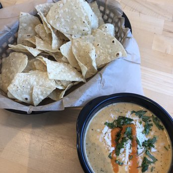 Torchy's Tacos - Green chile queso & chips: great! - Tacos Near Me - Austin, Texas Torchy's Tacos - Green chile queso & chips: great! - Tacos Near Me - Austin, Texas