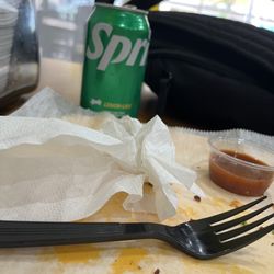 Taco Taxi - Marinated pork tacos I finished. Sprite, Limes, spicy taco sauce.