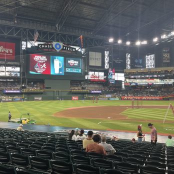 Chase Field - Interior of Chase Field in Phoenix, AZ, showing the baseball field, scoreboard, and spectators seated in the stands. - Stadiums & Arenas Near Me - Phoenix, Arizona