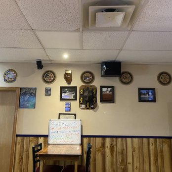 Rakestraw Enterprises - a wall of clocks on the wall - Venues & Event Spaces Near Me - Annawan, Illinois
