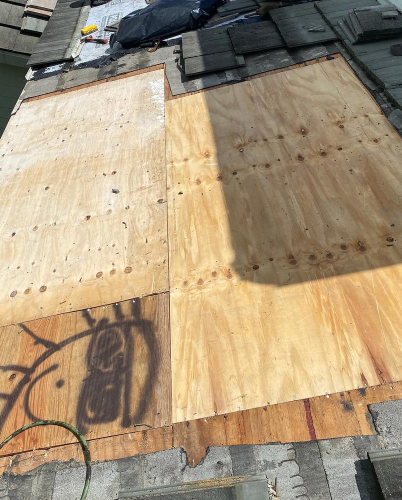 Slide of Doing Roofing, Co.