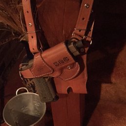 My .45 ACP shoulder rig hanging on the newel post. My .45 ACP shoulder rig hanging on the newel post.