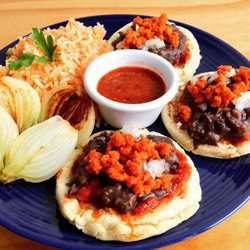 Cali Café - Traditional Sopes with soy chorizo and black beans.